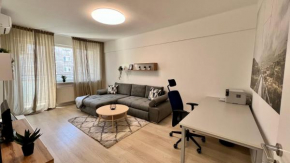 Priestranný apartmán blízko centra